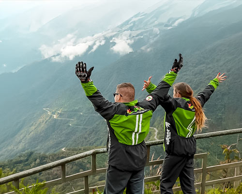 Two tourists at the Carrizales viewpoint on the Inca Jungle Trail