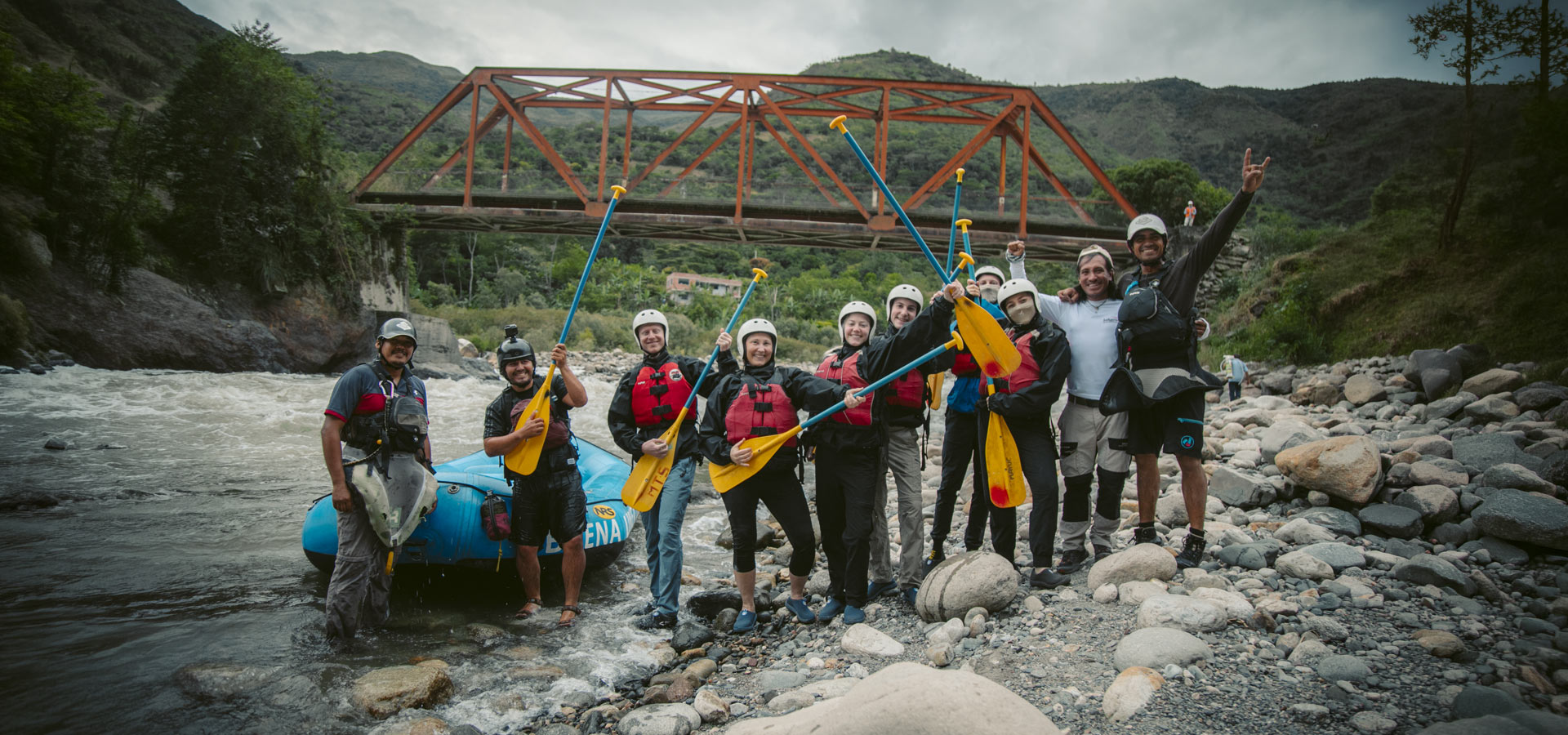 Group of happy tourists at the start of rafting on the Inca Jungle Route to Machu Picchu